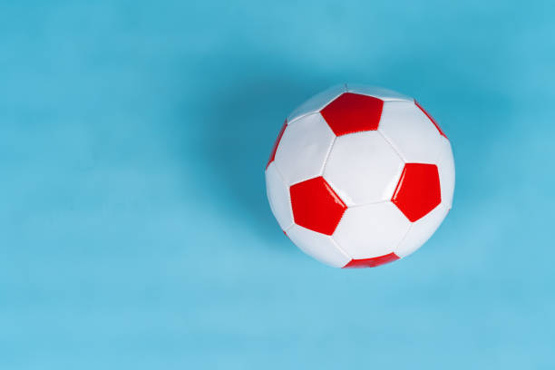 istock Ball for soccer game on a paper background 2203232948