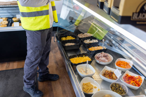 istock Unrecognisable Man at Food Counter 2203234789