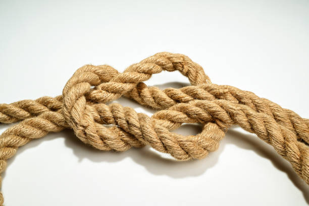 Knot on rope isolated on white. Related images in