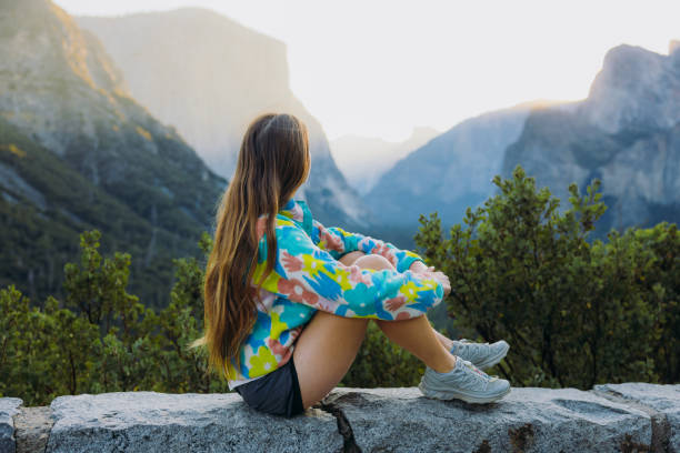 istock Traveller Admiring Dramatic Sunrise Over Yosemite Valley 2203237567