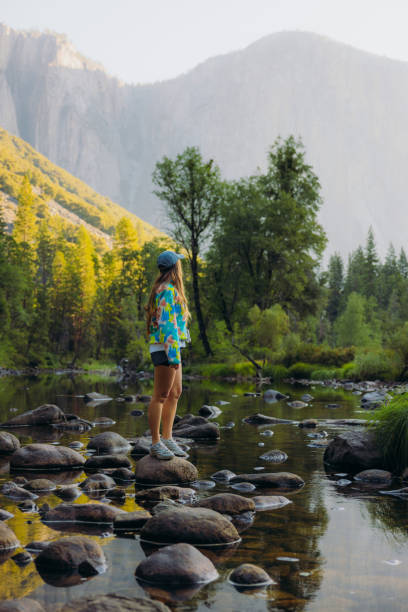istock Traveller Admiring Scenic Summer Sunrise at Yosemite Valley 2203238075