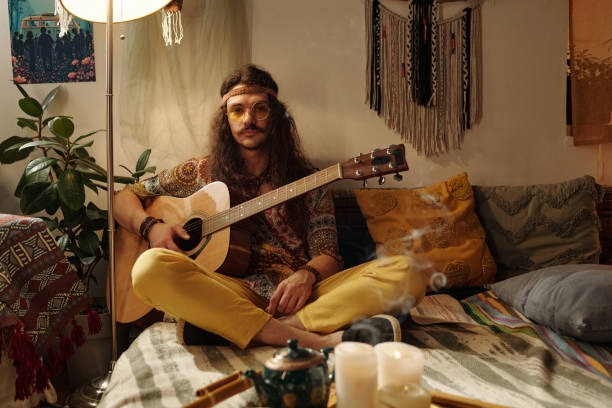 Playing Acoustic Guitar in Bohemian Themed Room