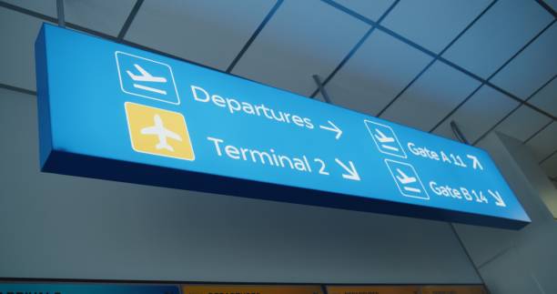 istock Blue Navigation Sign Directing Passengers to Departures, Terminals And Gates 2203242521