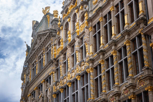 Grand Place, Brussels—stunning baroque architecture with gilded facades, ornate sculptures, and historic guild houses. A UNESCO site showcasing Belgium’s rich heritage and European elegance.