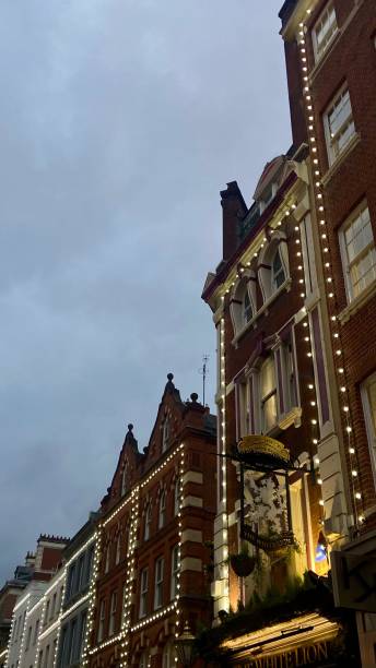 istock illuminated streets of soho london 2203243341