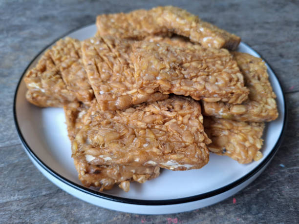 istock Tempe Goreng Or Fried Tempeh On A Plate. Food Menu. 2203243394