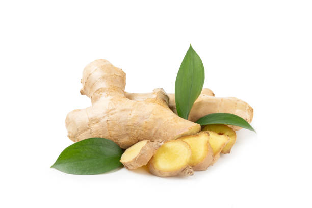 istock Fresh ginger and lemon isolated on white background. Sliced ​​ginger. Ginger root. Traditional alternative medicine, healing tea for immunity. Close-up. 2203243909