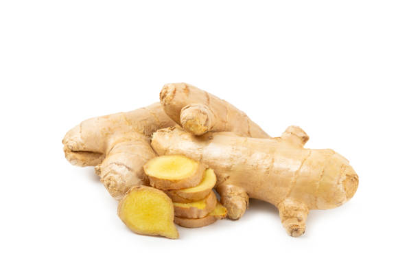 istock Fresh ginger and lemon isolated on white background. Sliced ​​ginger. Ginger root. Traditional alternative medicine, healing tea for immunity. Close-up. 2203243923