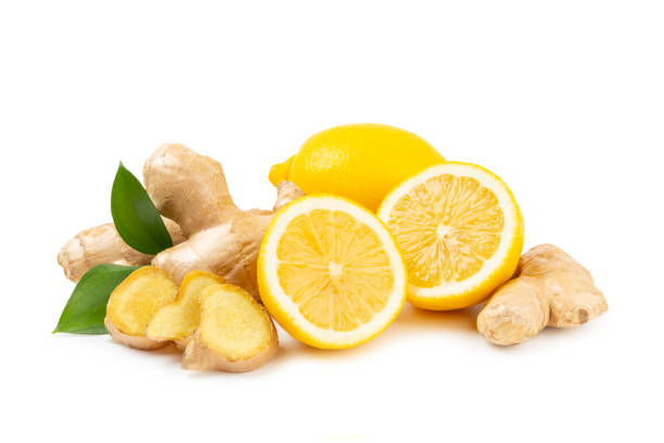 istock Fresh ginger and lemon isolated on white background. Sliced ​​ginger. Ginger root. Traditional alternative medicine, healing tea for immunity. Close-up. 2203243933