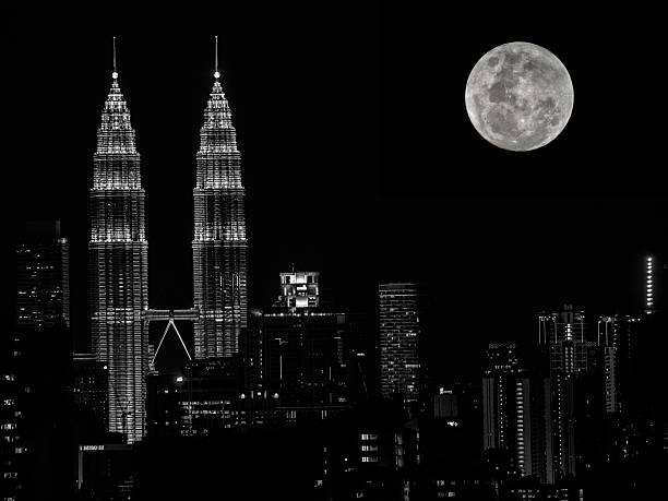 Supermoon very close the to KLCC building. A monochrome image
