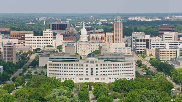 istock Downtown Lansing Michigan with Capitol Building on Bright Day 2203245438