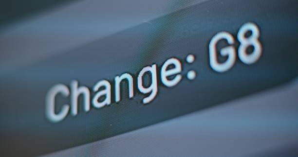 istock Arrival and Departure Information Display Changing Status of Plane Flight. Cancellation Flight 2203251690