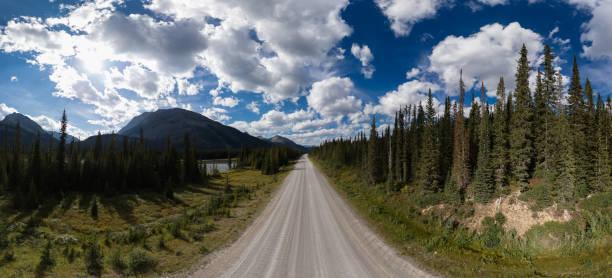 istock Scenic Road Through Alberta Wilderness With Mountain Views 2203252672