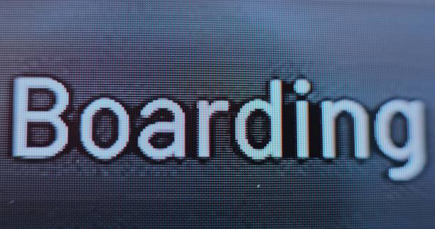 istock Arrival and Departure Monitor Changing Status on Final Call, Calling Passengers to Board Flight 2203252728