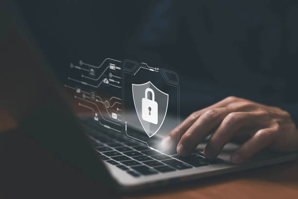 istock laptop shows the icon lock shield for cybersecurity. concept of secure privacy data, protect cybercrime attacks. password safe for business 2203252771