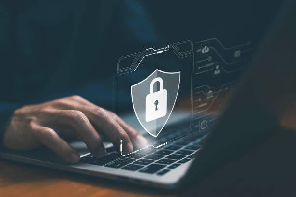 istock laptop shows the icon lock shield for cybersecurity. concept of secure privacy data, protect cybercrime attacks. password safe for business 2203252779