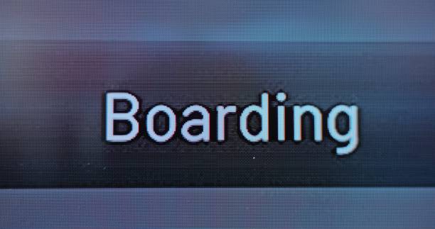istock Close Up of Arrival and Departure Information Display Changing Status on Final Call 2203255391