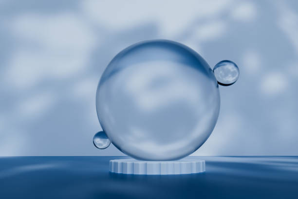 istock A clear sphere with two smaller spheres inside of it 2203255861