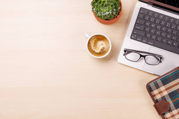 istock A clean and minimal desk setup featuring a laptop and a coffee cup 2203257526