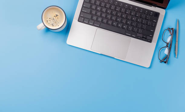 istock A clean and minimal desk setup featuring a laptop and a coffee cup 2203257586