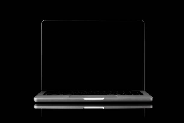 istock Laptop with a blank screen isolated on a black background 2203257877