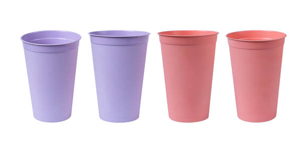 istock Pastel colored recycled plastic drinking glasses isolated on white background. 2203258854