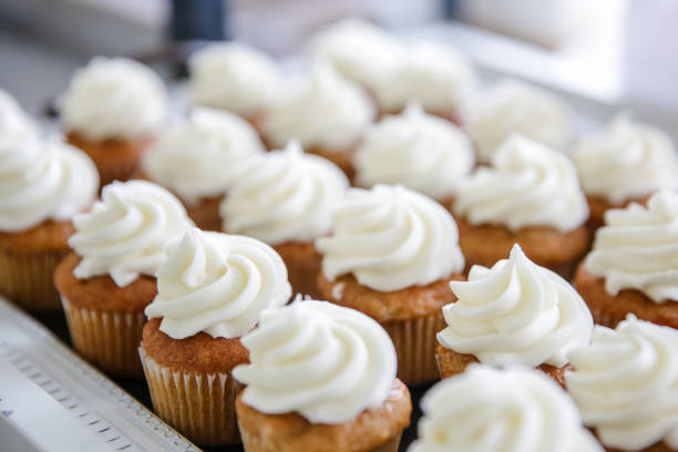 istock Vanilla cupcakes with white buttercream frosting 2203261246