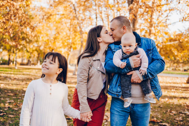 istock Happy family enjoy in park 2203262212
