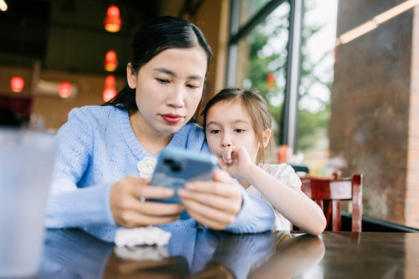 A Vietnamese family enjoy a \