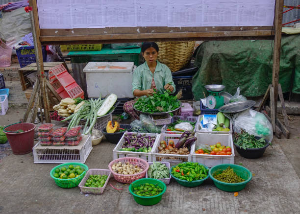 Yangon, Myanmar - Feb 1, 2017. Street market in Yangon, Myanmar. Yangon is Myanmar largest city and its most important commercial centre.