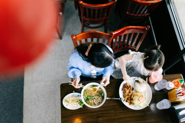 istock Mother Daughter Lunch Date for Pho 2203263474
