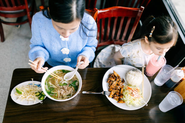 istock Mother Daughter Lunch Date for Pho 2203263478