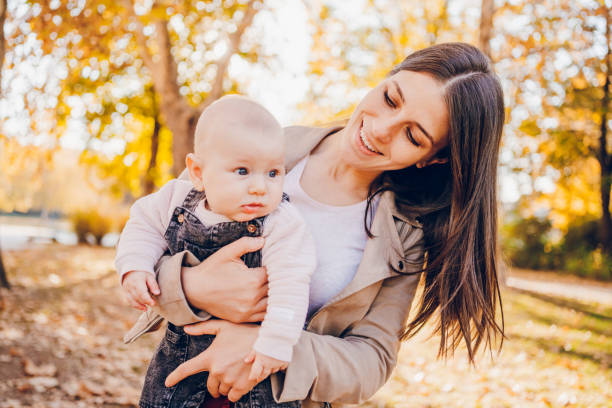 istock Mother enjoy with baby in park 2203263643