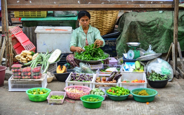 Yangon, Myanmar - Feb 1, 2017. Street market in Yangon, Myanmar. Yangon is Myanmar largest city and its most important commercial centre.