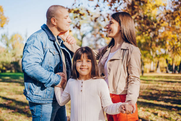 istock Happy family enjoy in park 2203265073