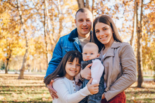 istock Happy family enjoy in park 2203265957