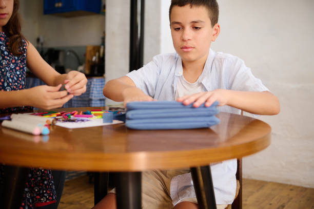 istock Children Engaged in Creative Activities 2203267419