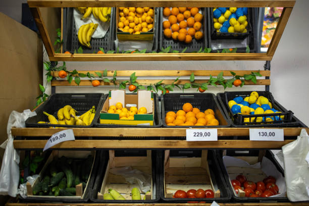 istock Fresh Fruit and Vegetable Assortment in Crates at Local Greengrocer 2203269552