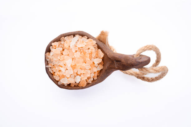 Organic himalayan pink salt on white background