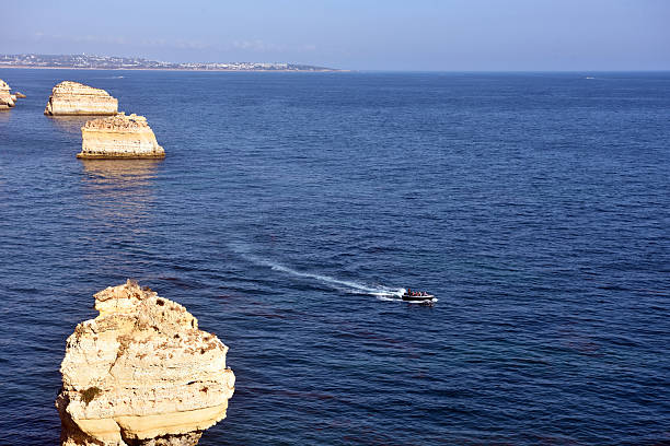 walking path with breathtaking views through the coast from porches to benagil caves lagoa algarve portugal