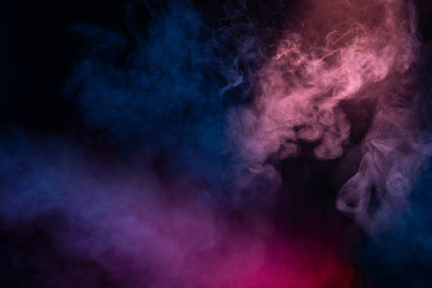 istock Blue and pink steam on a black background. 2203281235