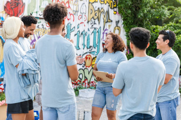 istock Diverse Group of Volunteers Discussing Community Project 2203282638