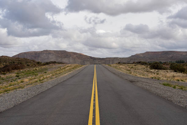 istock Low angle view of road in remote location 2203283526