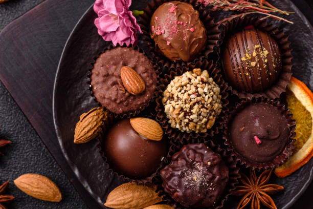 istock Homemade chocolate candies with different fillings and sprinkles 2203288303