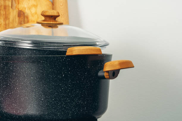istock Set of cookware utensils on a kitchen counter 2203288422