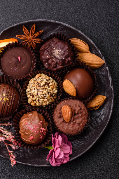 istock Homemade chocolate candies with different fillings and sprinkles 2203289485