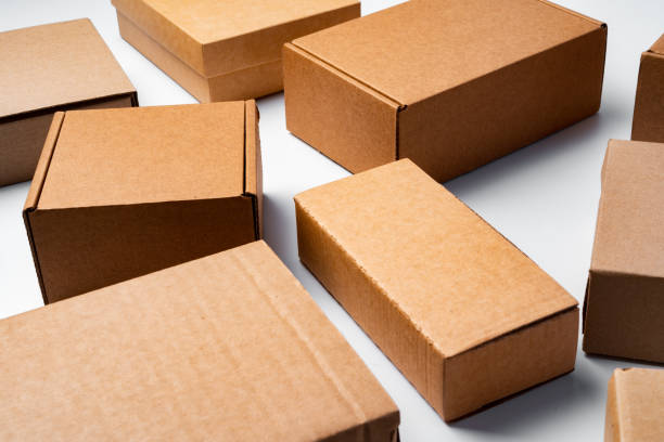 istock Lot of cardboard boxes on white background 2203292050