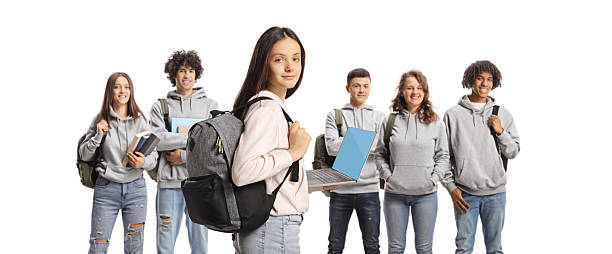 istock Group of students and a schoolgirl holding a laptop computer 2203295601