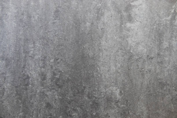 istock Abstract Gray Grunge Concrete Wall Texture with Rough Weathered Surface Details 2203300392