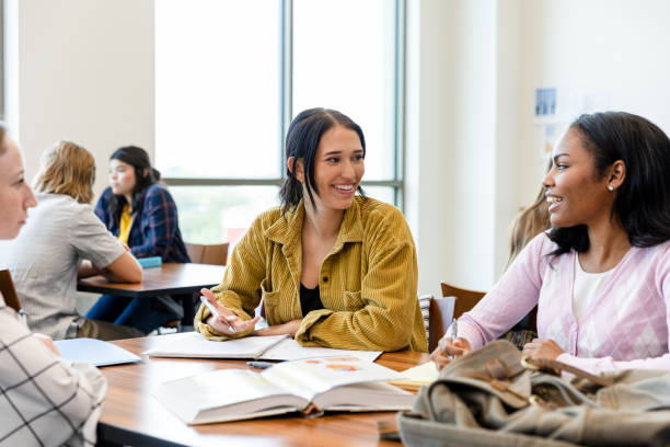istock Two Diverse Female Students Studying Together in a Classroom 2203305682